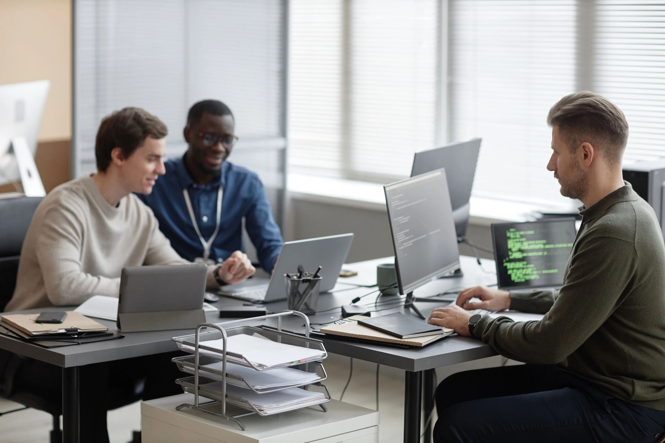 Technology professionals in a modern office