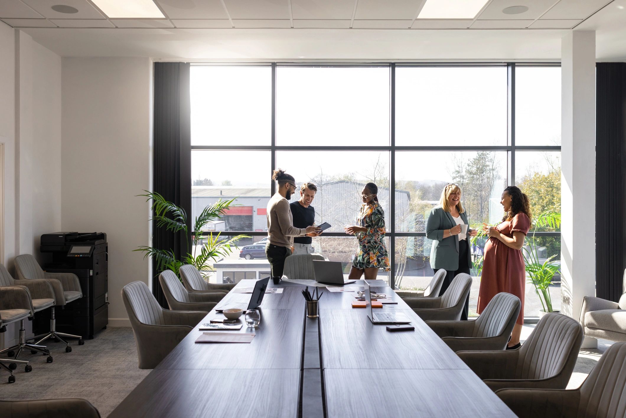 Business colleagues meeting in a modern technology-focused office